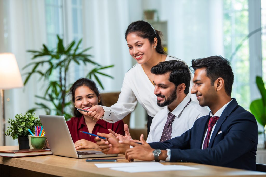 WHC team in a workplace meeting.